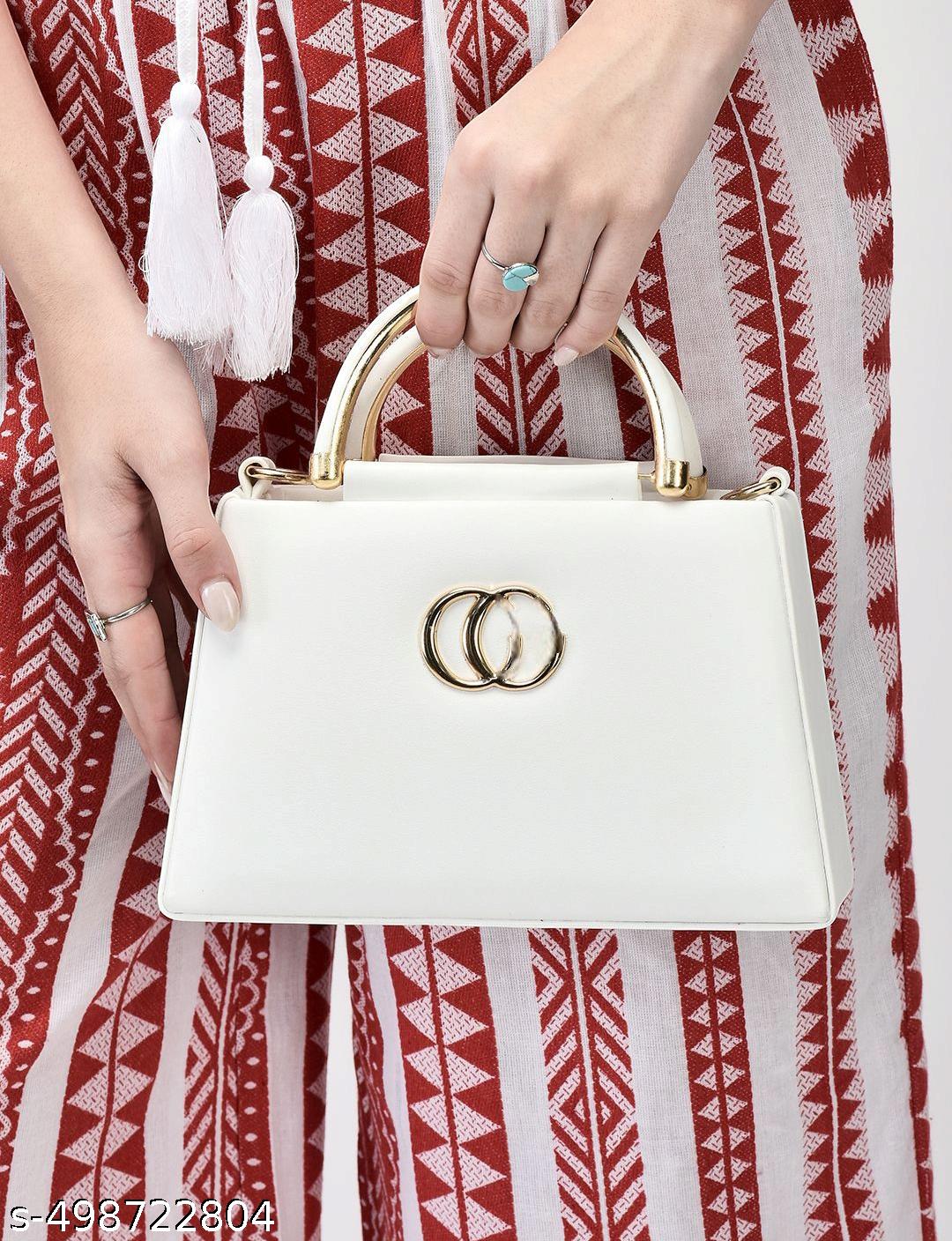 Designer Handbag with Gold Accents & Detachable Strap - image 4